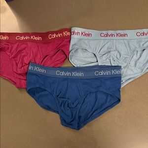 New Calvin Klein Cotton Low Rise Brief. 3 Set - Red, Blue, Lt Blue